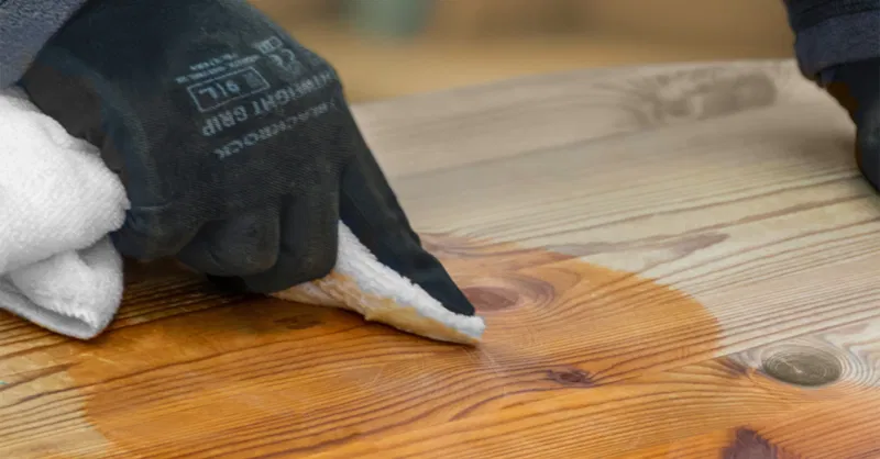polishing wood furniture with wax